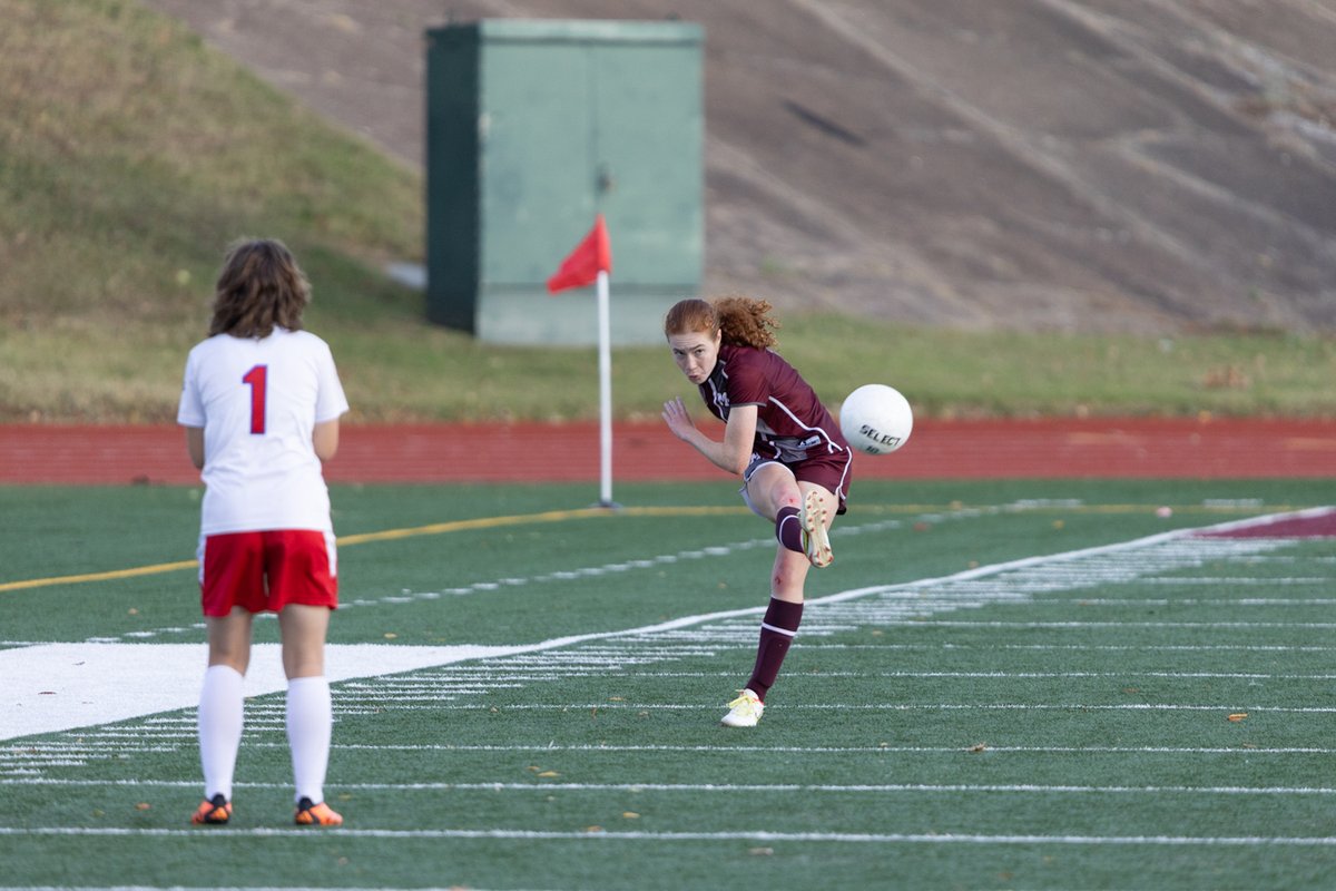 Soccer player taking a corner kick